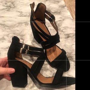 NWT black heels with gold buckles